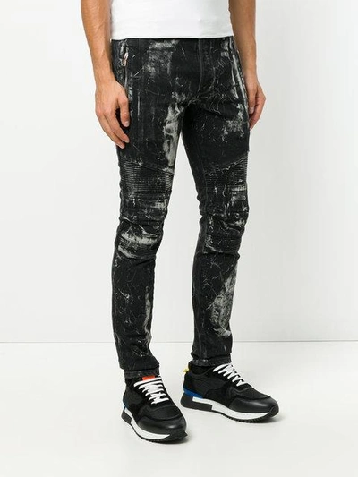 Shop Balmain Painted Look Biker Jeans In Black