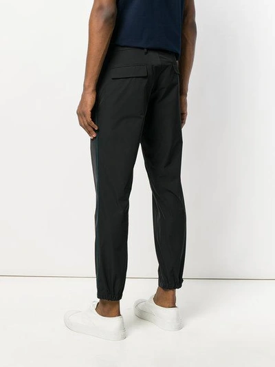Shop Prada Side Stripe Trousers - Black