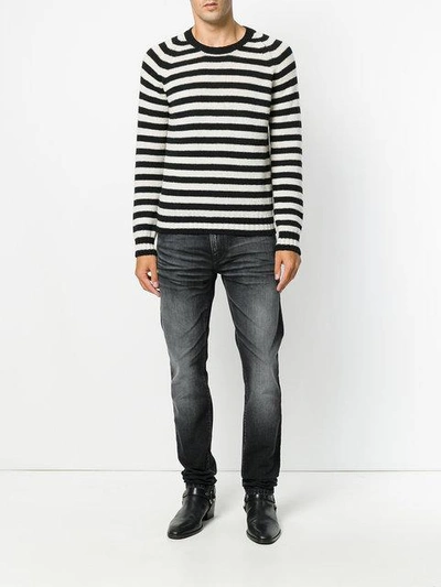 Shop Saint Laurent Faded Slim-fit Jeans In Black