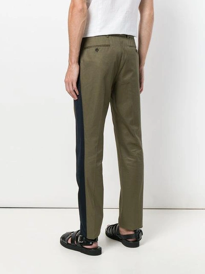 Shop Alexander Mcqueen Side Stripe Trousers - Green