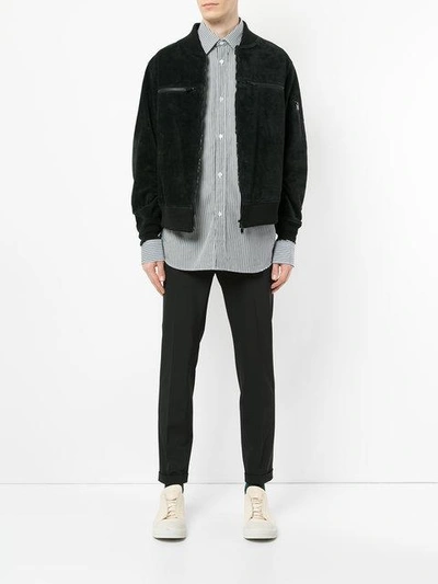 Undercover Zip Pocket Bomber Jacket In Black