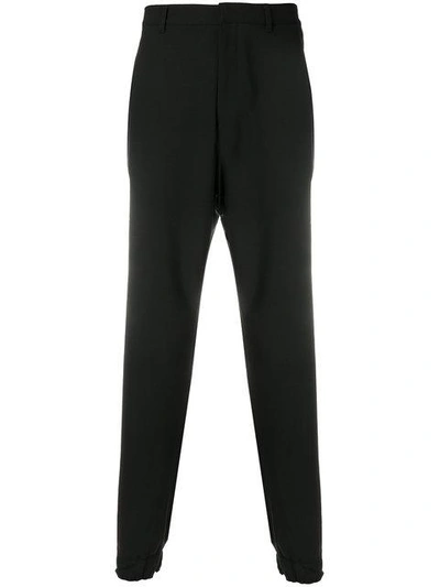 Shop Kenzo High-waisted Tapered Trousers - Black