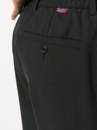 Shop Kenzo High-waisted Tapered Trousers - Black