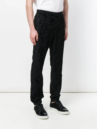 Shop Versace Barocco Texture Trousers In Black