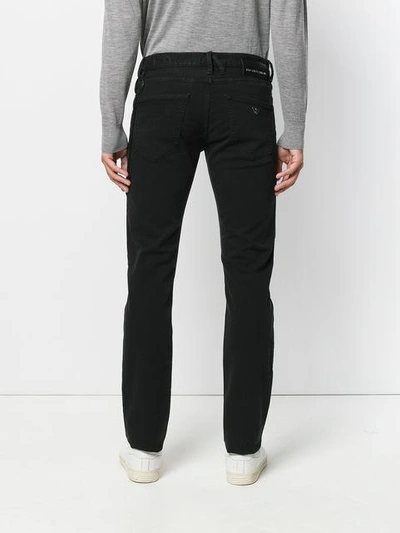 Shop Emporio Armani Chain Detail Jeans In Black