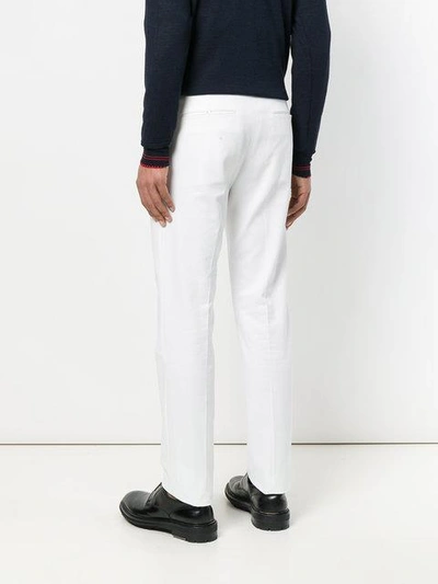 Shop Jil Sander Straight-leg Trousers - White