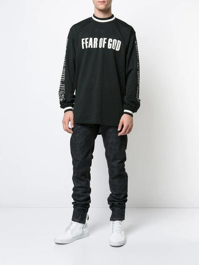 Shop Fear Of God Perforated Logo Printed Top