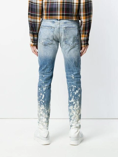 Shop Fear Of God Paint Splatter Jeans In Blue