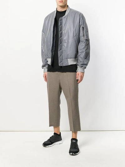 Shop Komakino Reflective Bomber Jacket - Metallic