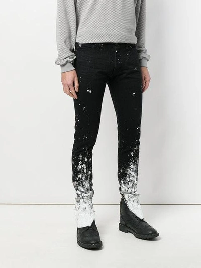 Shop Fear Of God Paint Detail Jeans In Black