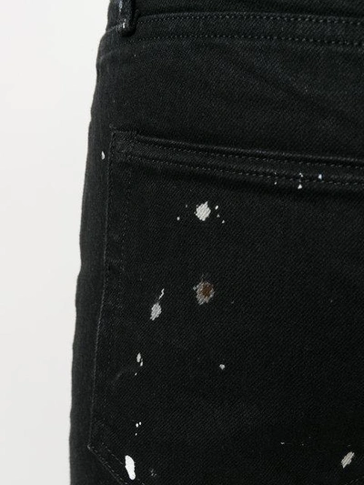 Shop Fear Of God Paint Detail Jeans In Black