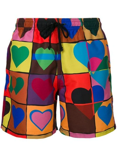 Shop Jw Anderson Heart Grid Swim Trunks - Multicolour