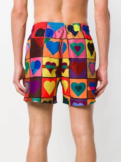 Shop Jw Anderson Heart Grid Swim Trunks - Multicolour