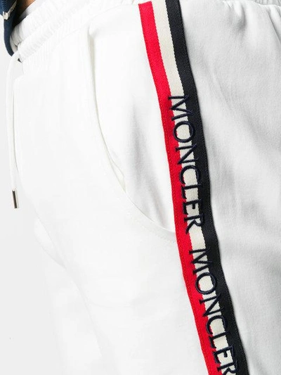 Shop Moncler Logo Stripe Track Pants - White
