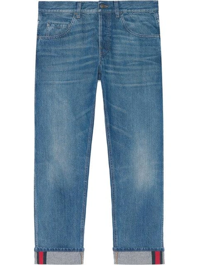 Tapered denim pants with Web