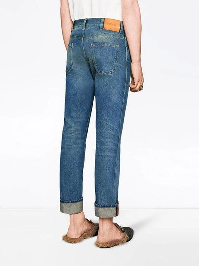 Shop Gucci Tapered Denim Pants With Web In Blue