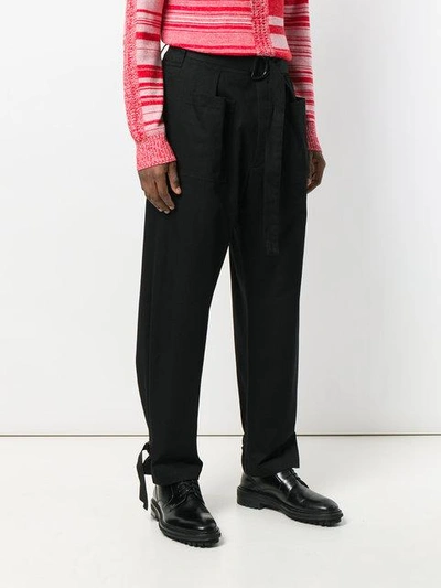 Shop Jil Sander Belted Trousers In Black