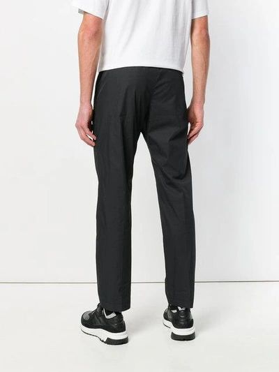 Shop Msgm Regular Fit Trousers - Black