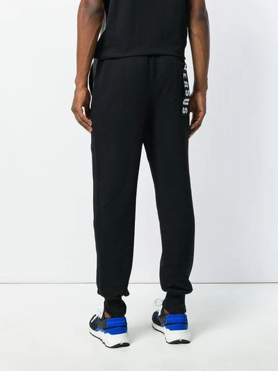 Shop Versus Logo Patch Sweat Pants In Black