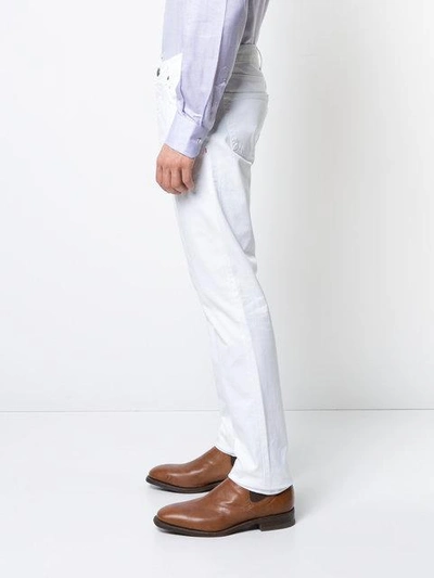 Shop Isaia Slim-fit Trousers - White