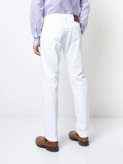 Shop Isaia Slim-fit Trousers - White