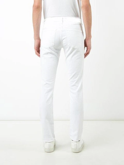 Shop J Brand Straight Jeans In White