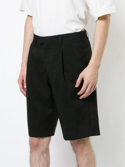 Shop Raf Simons Logo Patch Bermuda Shorts In Black