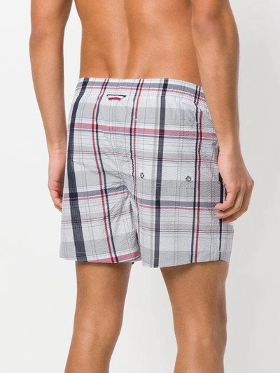 Shop Moncler Checked Swim Shorts In White