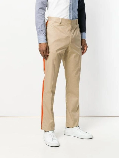 Shop Calvin Klein 205w39nyc Side Stripe Chinos - Brown