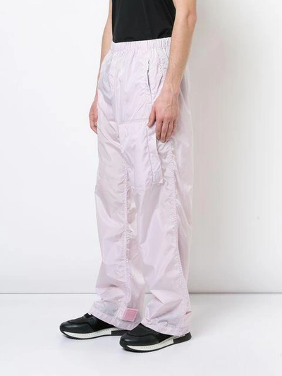 Shop Givenchy Elasticated Waist Trousers In Pink & Purple