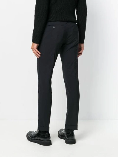 Shop Prada Slim-fit Trousers