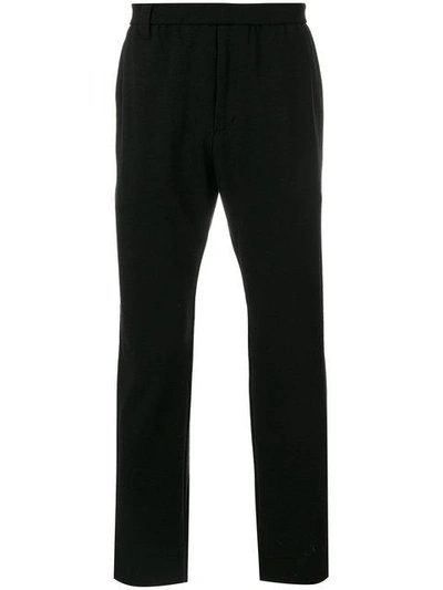 Shop White Mountaineering Classic Fitted Trousers - Black