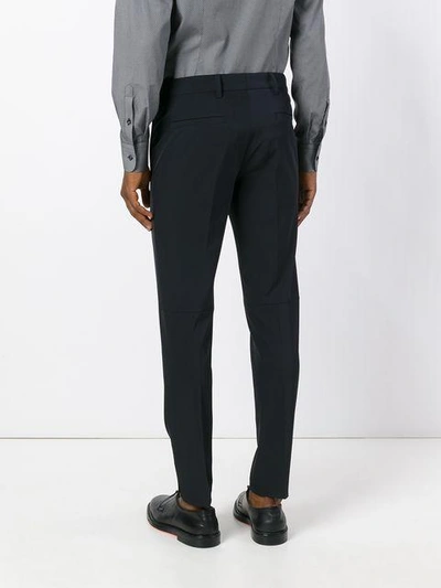 Shop Prada Techno Stretch Slim Fit Trousers In Blue