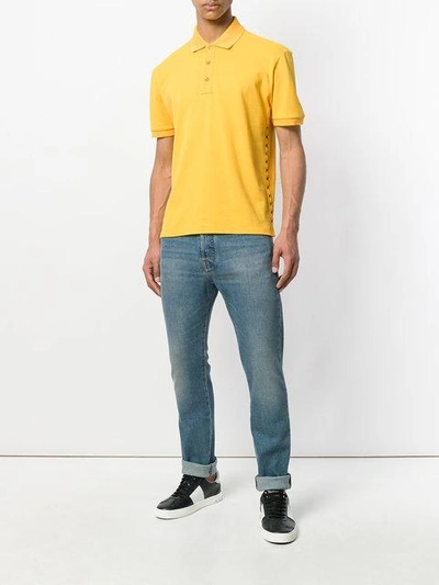 Shop Valentino 'rockstud' Poloshirt In Yellow