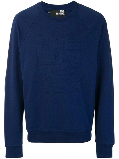 Shop Love Moschino Embossed Logo Sweatshirt