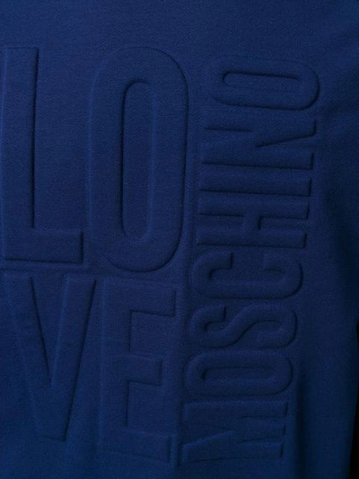 Shop Love Moschino Embossed Logo Sweatshirt