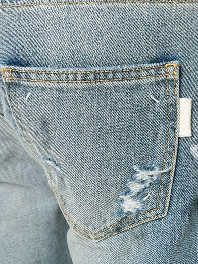 Shop Ih Nom Uh Nit Distressed Jeans In Blue