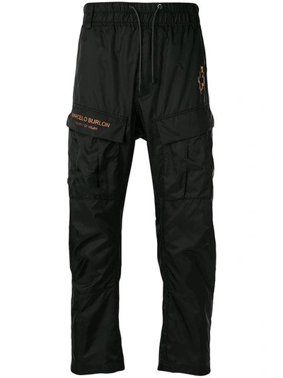 Shop Marcelo Burlon County Of Milan Fire Cross Track Trousers In Black