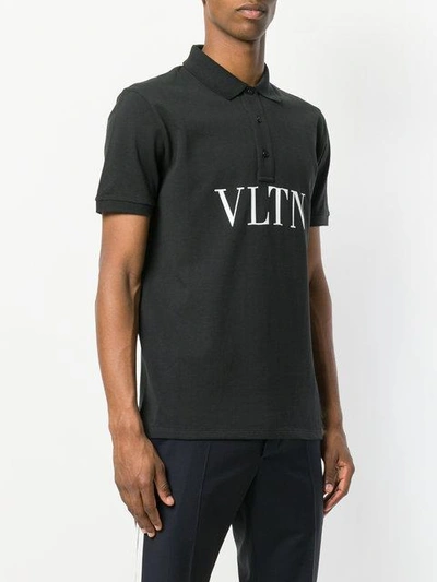 Shop Valentino Vltn Print Polo Shirt In Black