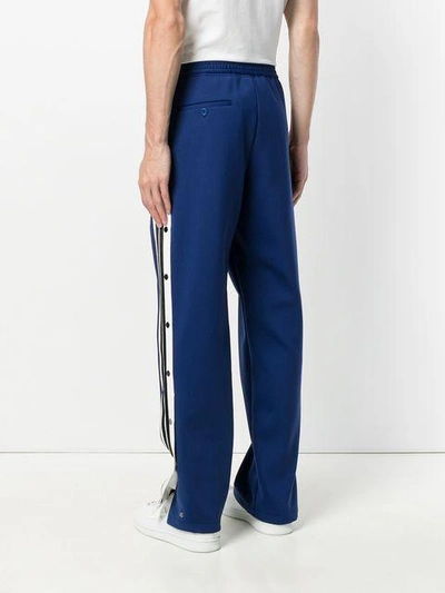 Shop Neil Barrett Striped Piped Track Pants In Blue