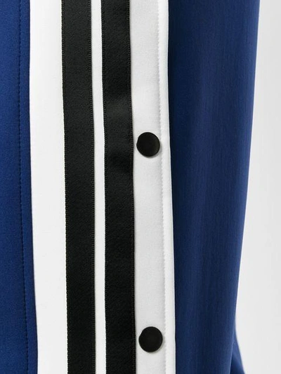 Shop Neil Barrett Striped Piped Track Pants In Blue