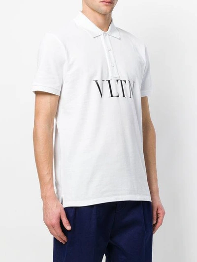 Shop Valentino Vltn Print Polo Shirt In White