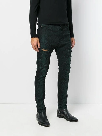 Shop Balmain Snake Print Jeans In Green