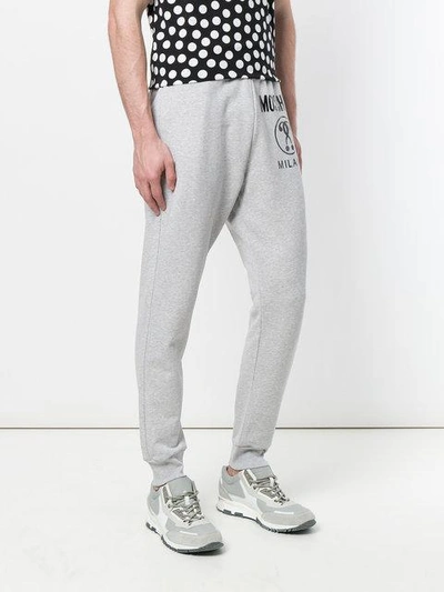 Shop Moschino Logo Tracksuit Bottoms In 1485 Grey Black