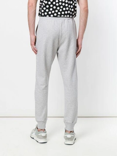 Shop Moschino Logo Tracksuit Bottoms In 1485 Grey Black