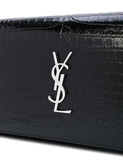 Shop Saint Laurent Monogram Crocodile-embossed Chain Wallet In Black