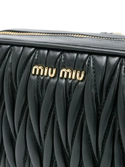 Shop Miu Miu Matelassé Leather Belt Bag - Black