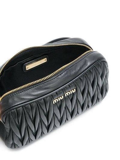 Shop Miu Miu Matelassé Leather Belt Bag - Black