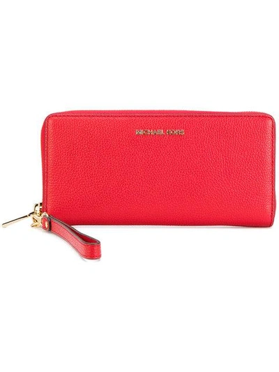 Shop Michael Michael Kors Mercer Continental Wristlet Wallet - Red