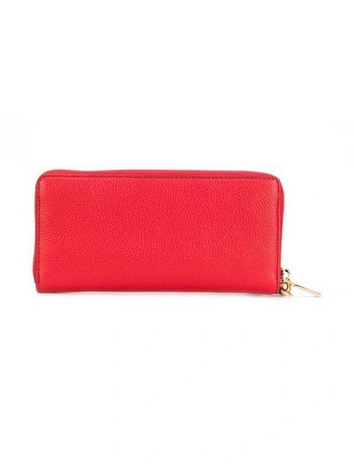 Shop Michael Michael Kors Mercer Continental Wristlet Wallet - Red